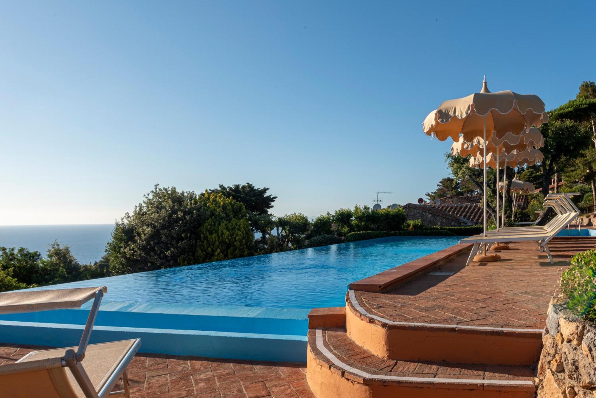 Boutique Hotel Torre Di Cala Piccola ポルト・サント・ステーファノ エクステリア 写真