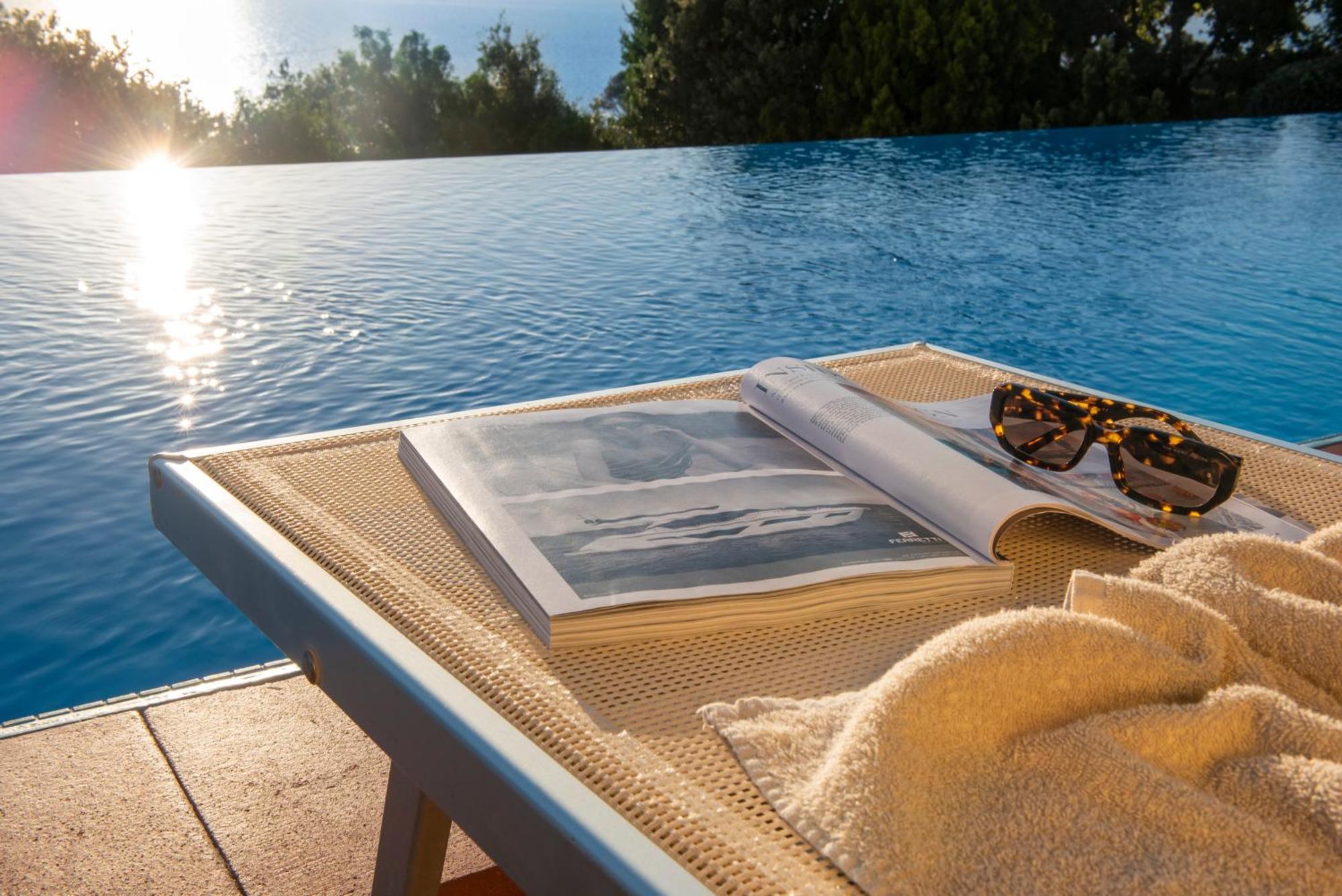 Boutique Hotel Torre Di Cala Piccola ポルト・サント・ステーファノ エクステリア 写真