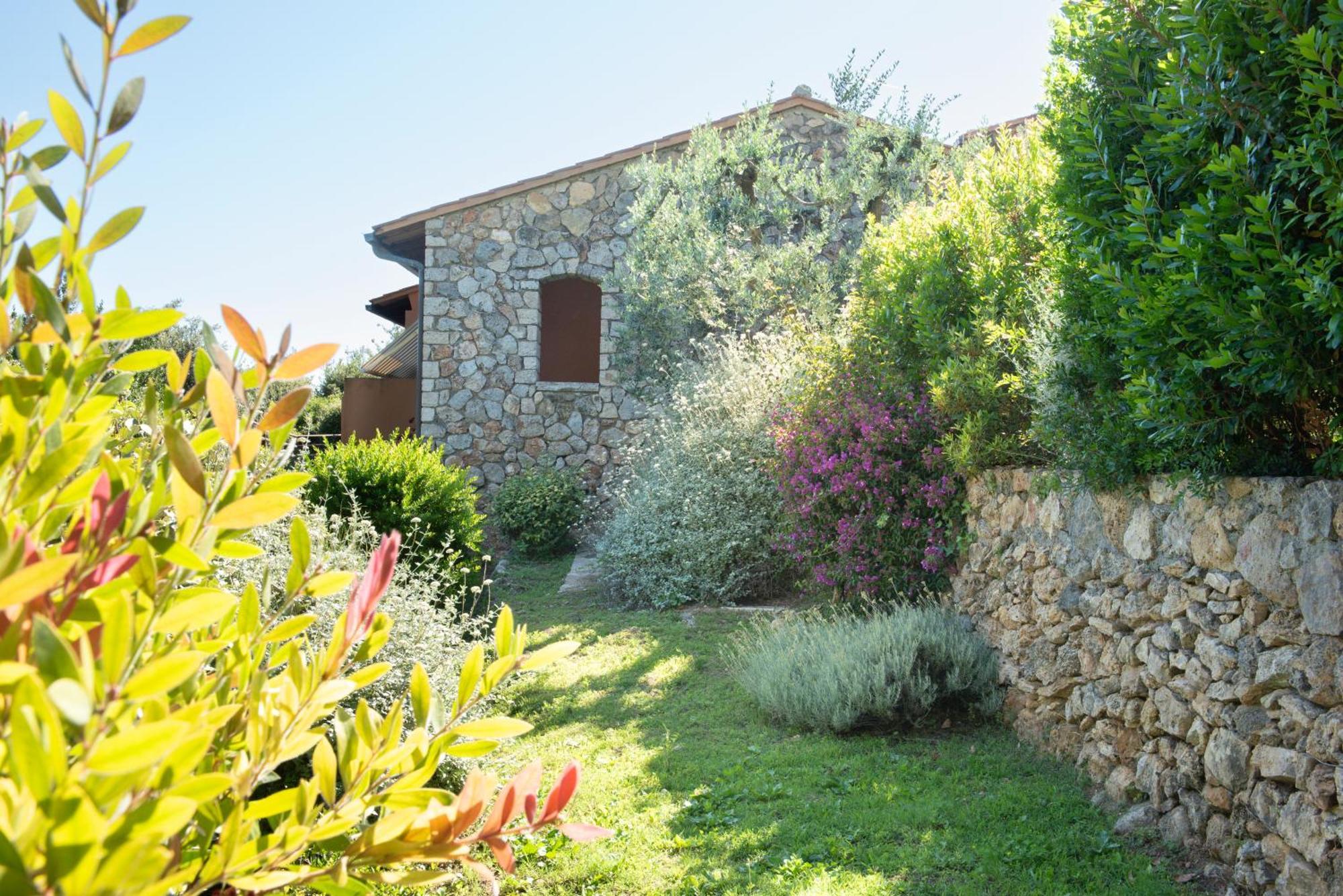 Boutique Hotel Torre Di Cala Piccola ポルト・サント・ステーファノ エクステリア 写真