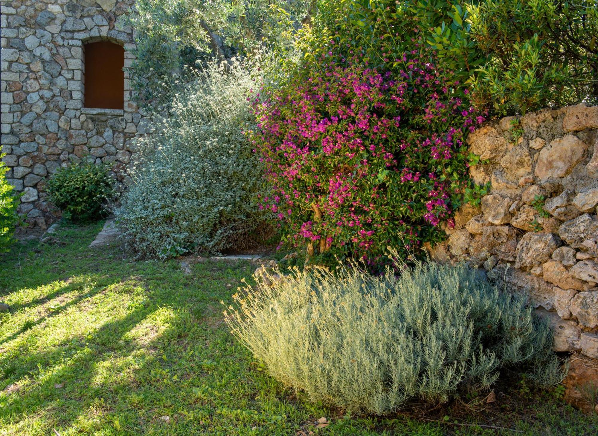 Boutique Hotel Torre Di Cala Piccola ポルト・サント・ステーファノ エクステリア 写真