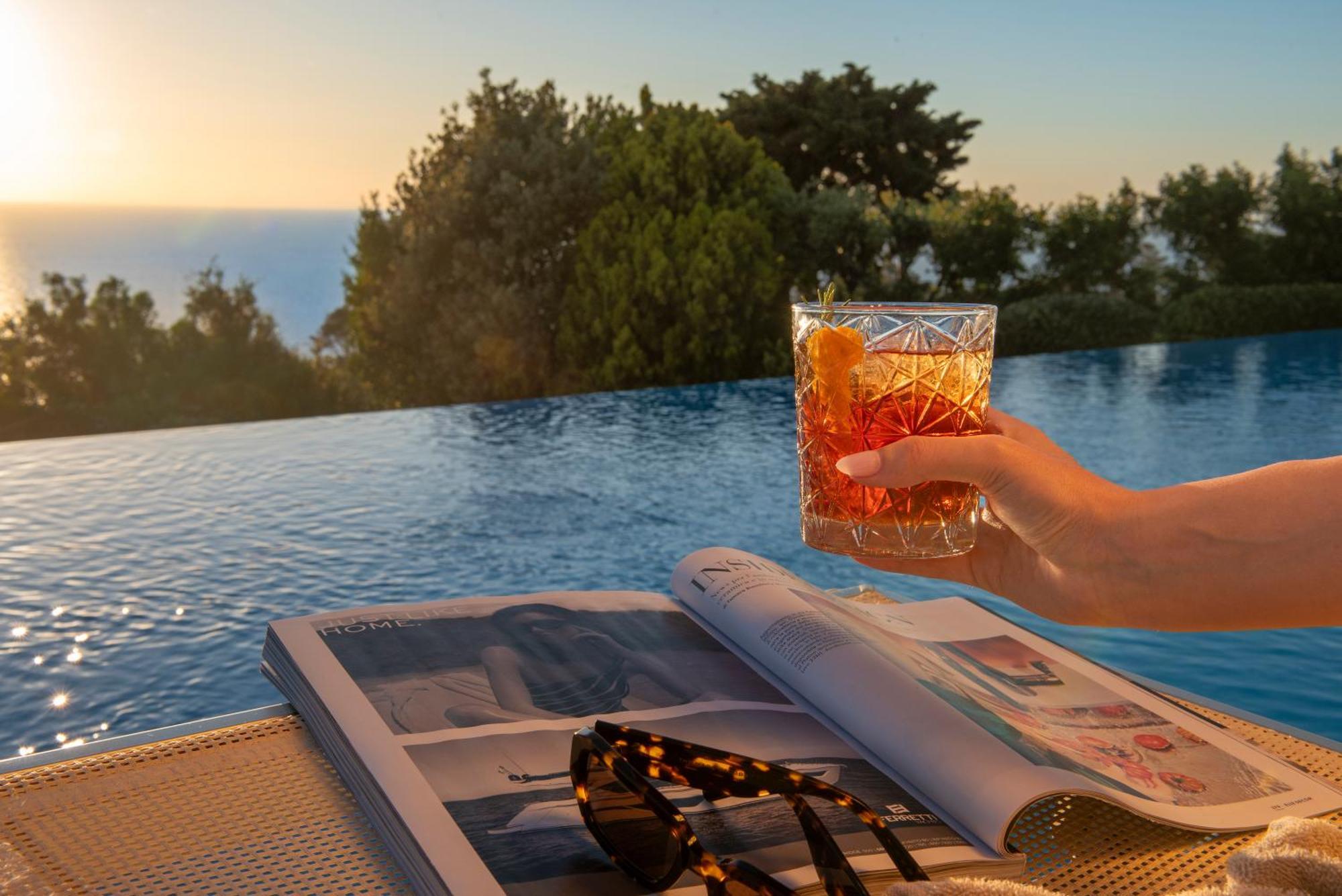 Boutique Hotel Torre Di Cala Piccola ポルト・サント・ステーファノ エクステリア 写真