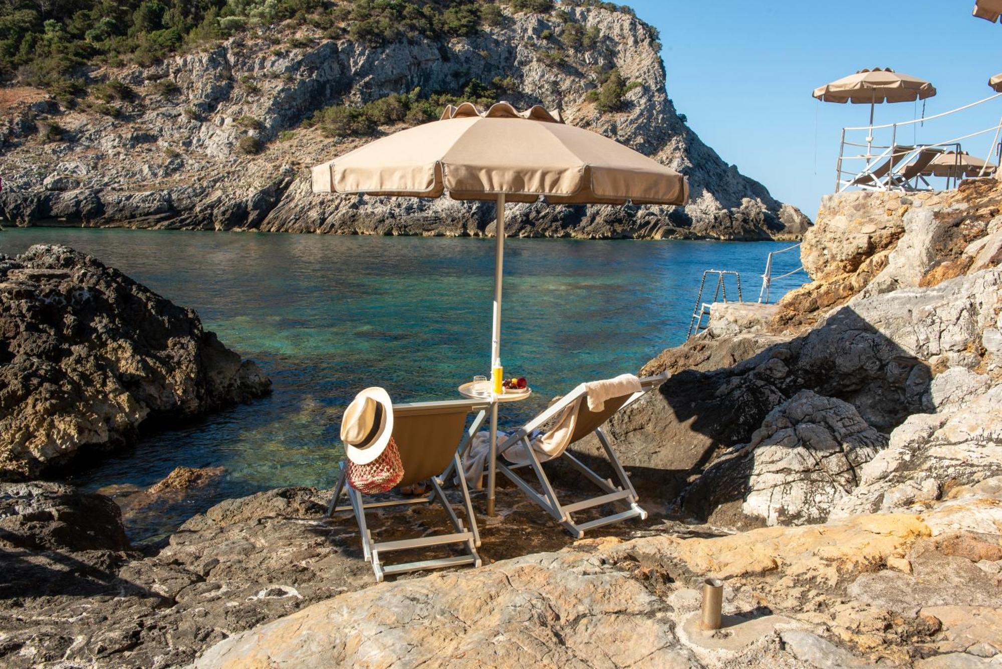 Boutique Hotel Torre Di Cala Piccola ポルト・サント・ステーファノ エクステリア 写真