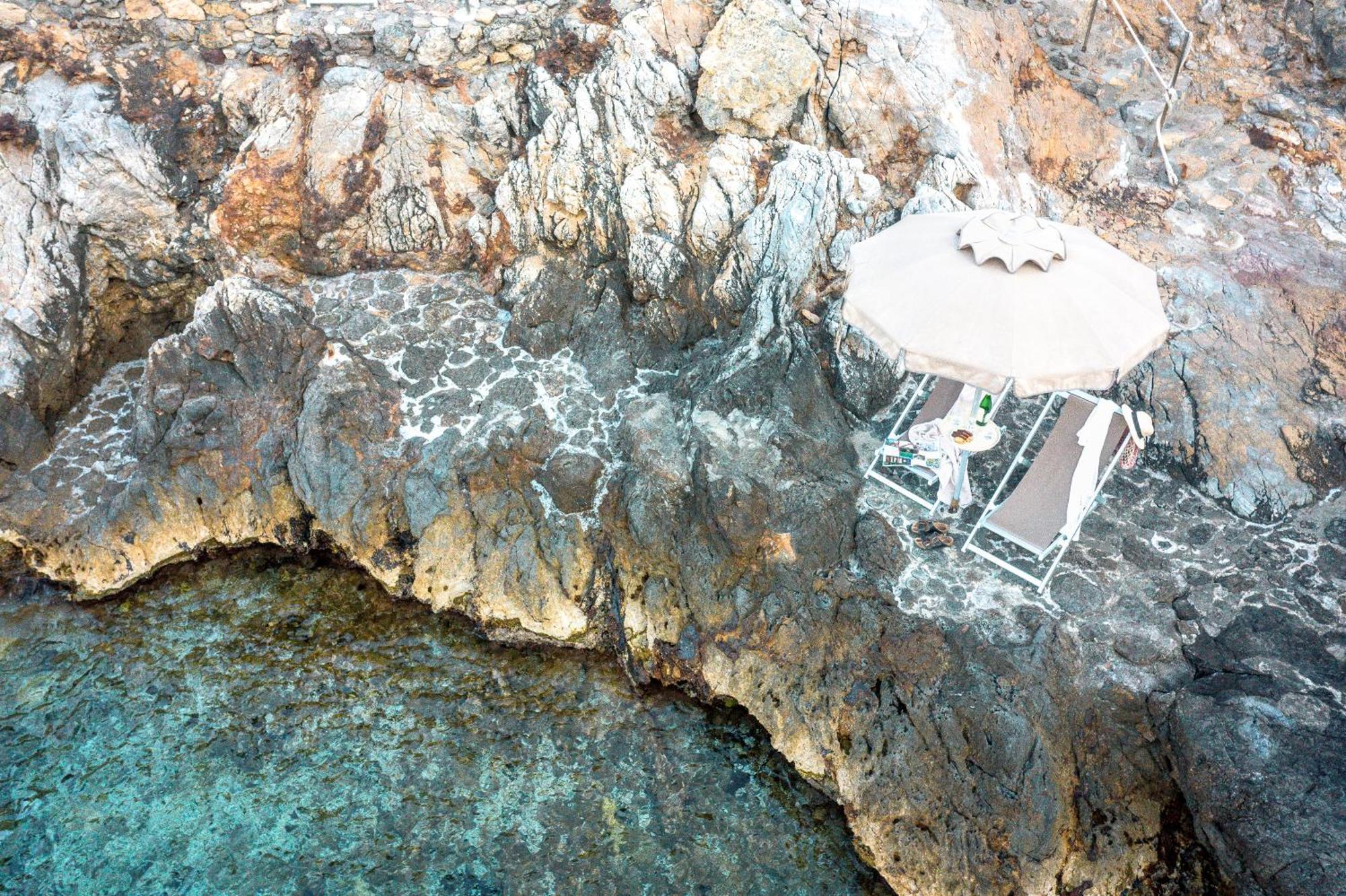 Boutique Hotel Torre Di Cala Piccola ポルト・サント・ステーファノ エクステリア 写真