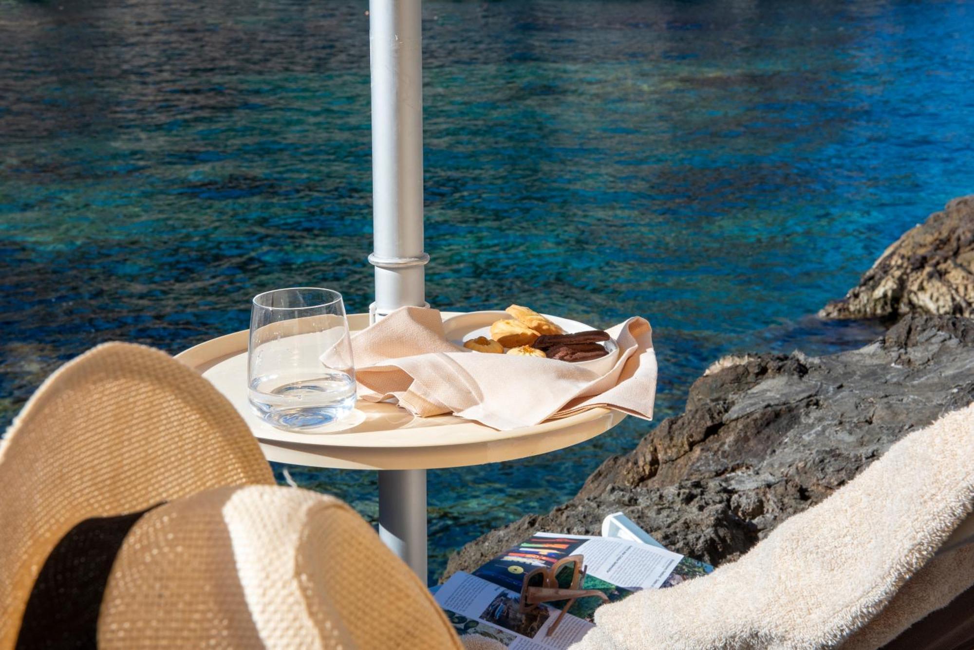Boutique Hotel Torre Di Cala Piccola ポルト・サント・ステーファノ エクステリア 写真