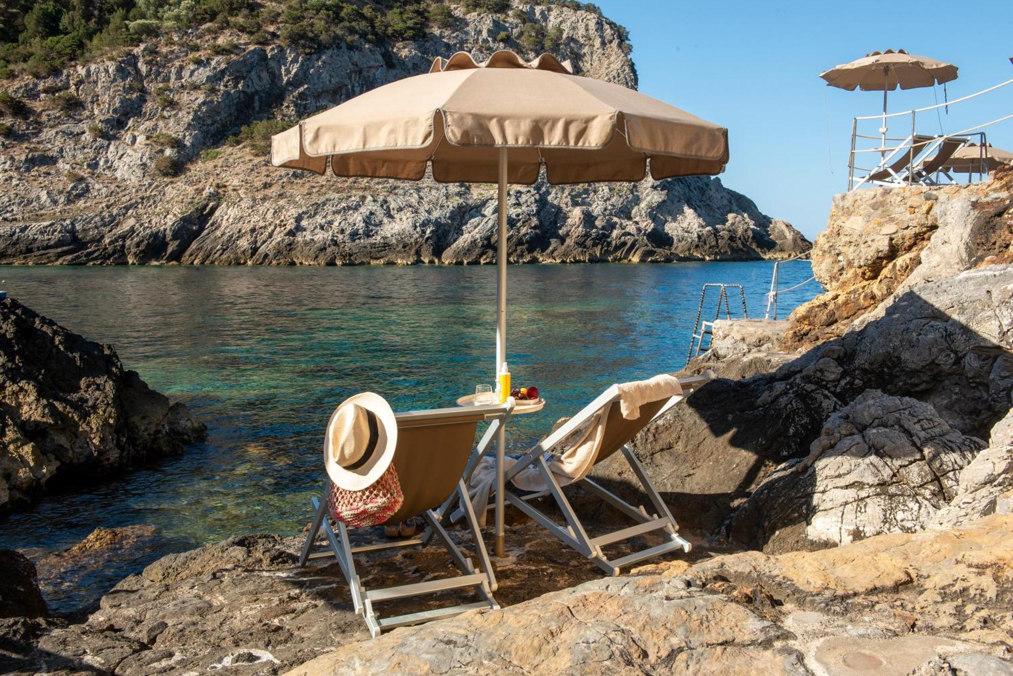 Boutique Hotel Torre Di Cala Piccola ポルト・サント・ステーファノ エクステリア 写真